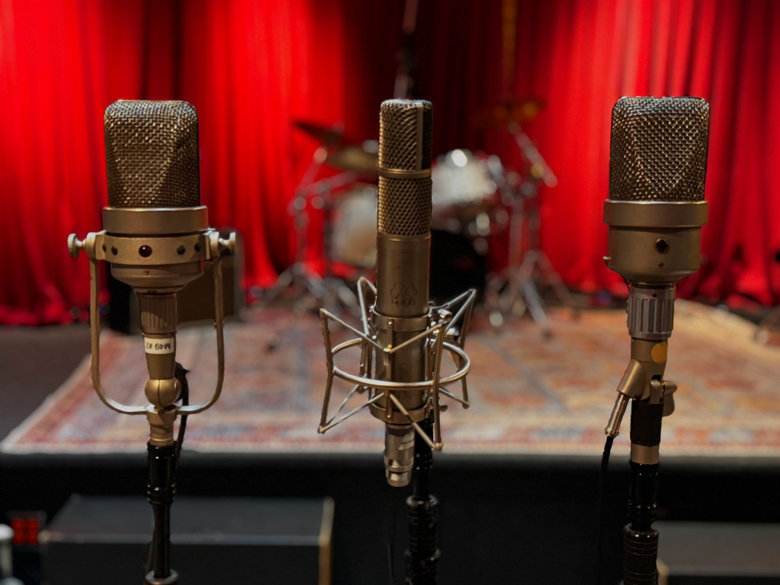 Two Neumann M-49 tube microphones flanking an AKG C-24 stereo tube microphone on the Live Room stage, Clearmountain's Berkeley Street Studios Santa Monica
